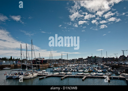 Pleasure boats in Paimpol Marina in Brittany France, with blue sky, Côtes d'Armor for cruising, vacation, holiday Stock Photo