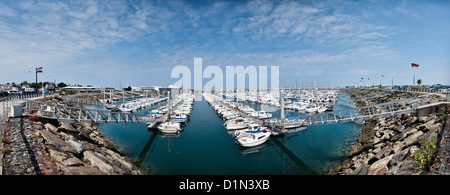 Pleasure boats in Saint-Quay Portrieux Marina in Brittany France with blue sky, Côtes d'Armor, cruising vacation, panoramic view Stock Photo