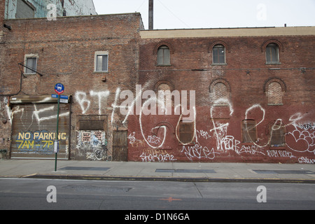 Graffiti on rundown buildings in the Bedford-Stuyvesant neighborhood, Brooklyn, NY. Stock Photo