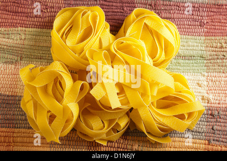 Uncooked dry Pappardelle Stock Photo - Alamy