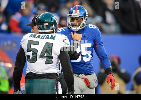 Philadelphia Eagles defensive end Brandon Graham (55) celebrates with the  George Halas NFC Championship Trophy after the Eagles defeated the  Minnesota Vikings 38-7 to win the NFC Championship at Lincoln Financial  Field