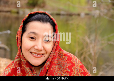 Young Latino woman smiling. Stock Photo
