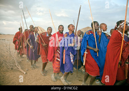 Maasai Worriers or men and women seen in Olpopongi Maasai Cultural Village in Tanzania;East Africa;Africa Stock Photo