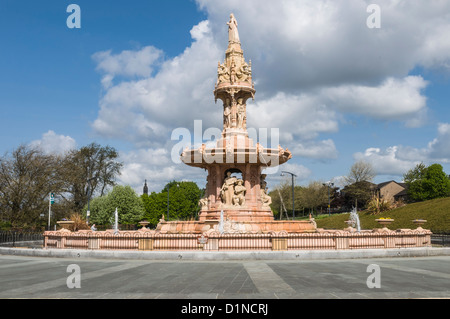 Doulton Fountain Glasgow Green Glasgow. The world's largest Terracotta fountain. The Doulton Fountain was gifted to the city by Sir Henry Doulton and first unveiled at the Empire Exhibition held at Kelvingrove Park in 1888.  The fountain was then moved to Glasgow Green in 1890. Stock Photo