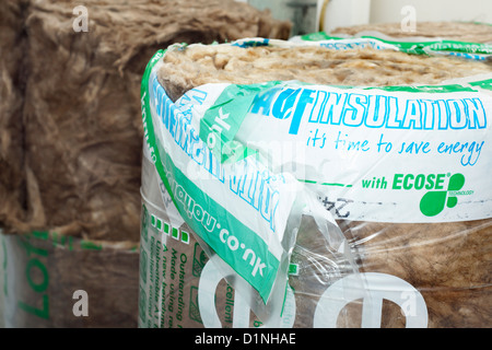 Rolls of Earthwool Carbon zero loft & cavity insulation to insulate loft space for retaining heat & saving energy Stock Photo