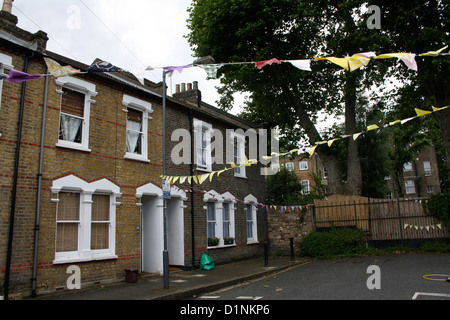 Bunting at a street party in Louisa Gardens, Stepney, east London Stock Photo