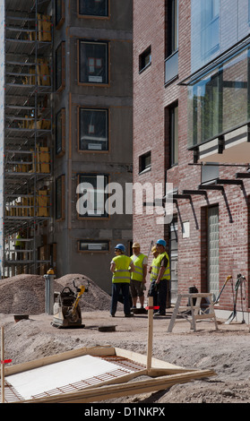 Engineers working on construction site Stock Photo