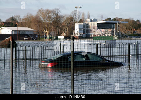 Worcester, UK. 1st Jan, 2013. A submerged car at the flooded Worcester racecourse on New Year's Day. Stock Photo