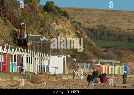 Swanage cliffs and beach huts at the northern end of Swanage bay Stock Photo