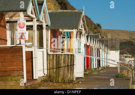 Swanage cliffs and beach huts at the northern end of Swanage bay Stock Photo