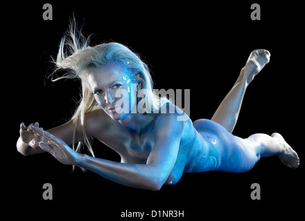 mystic mermaid theme showing ablue bodypainted woman in black back