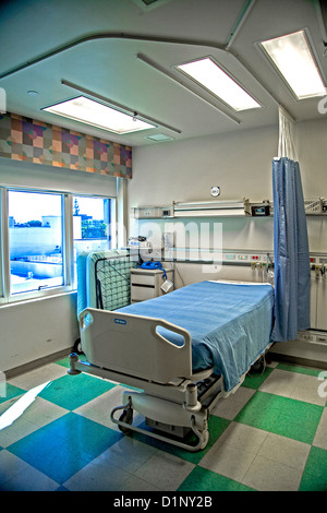 An empty room stands ready for a patient at a hospital in Orange, CA. Stock Photo