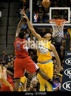 Jan. 1, 2013 - Denver, CO, USA - Denver Nuggets JAVALE MCGEE, right, tries to black a shot from DEANDRE JORDAN, left, during the 1st. half at the Pepsi Center Monday night. The Nuggets beat the Clippers 92-78. (Credit Image: © Hector Acevedo/ZUMAPRESS.com) Stock Photo