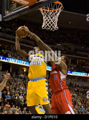 Jan. 1, 2013 - Denver, CO, USA - Denver Nuggets KENNETH FARIED, left, goes up for a lay up with DEANDRE JORDAN, right. of the Clippers during the 1st. half at the Pepsi Center Monday night. The Nuggets beat the Clippers 92-78. (Credit Image: © Hector Acevedo/ZUMAPRESS.com) Stock Photo