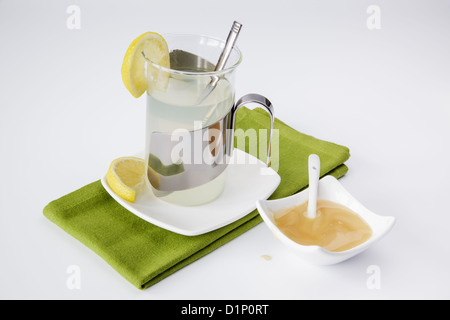 soothing drink of hot lemon and honey Stock Photo