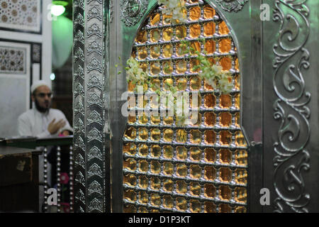 Jan. 1, 2013 - Cairo, Cairo, Egypt - Egyptian Muslims pray at a tomb in al-Hussein mosque, which according to the belief head of Imam Hussein, the grandson of prophet Mohammed, is buried, in the old city of Cairo on Jan. 1, 2013  (Credit Image: © Ashraf Amra/APA Images/ZUMAPRESS.com) Stock Photo