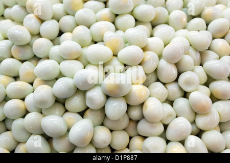 Boiled quail eggs in asian market Stock Photo
