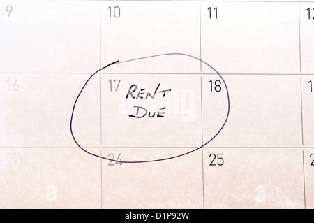 Rent due circled on a calendar Stock Photo - Alamy