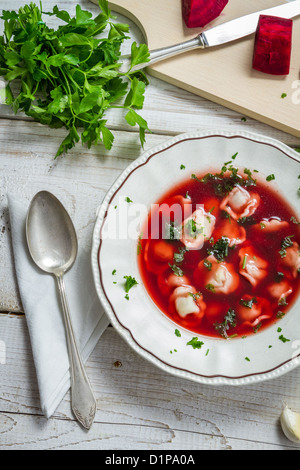 Homemade beetroot soup with dumplings Stock Photo