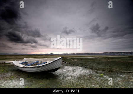 Marine landscape with a white boat and stormy sky Stock Photo