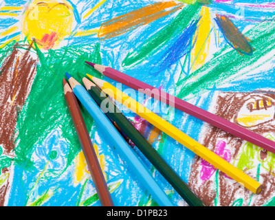 several colored pencils on children draw picture background Stock Photo