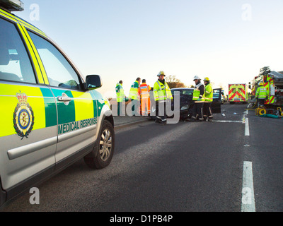 East Anglian Air Ambulance & medical response making a call at a road traffic accident in Norfolk with other emergency services Stock Photo