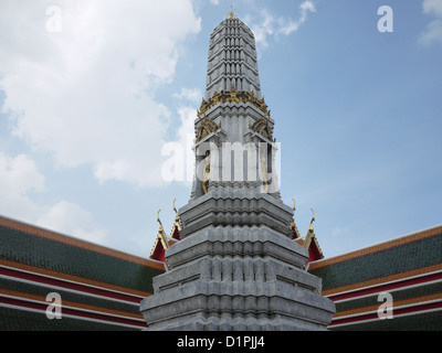 A prang is a tall tower-like spire, usually richly carved.  It is common shrine element of Buddhist architecture. Stock Photo