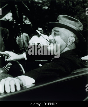 Franklin Roosevelt, 32nd President of the United States of America, Smoking Cigarette While Driving Automobile, 1939 Stock Photo