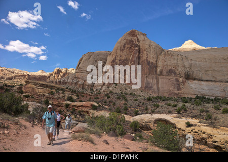 Tourists and visitors walking the Hickman Bridge Trail, Navajo Dome, Capitol Reef National Park, Utah, USA Stock Photo