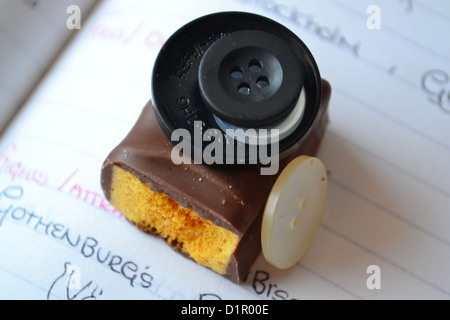 Embroidery and Chocolate. Stock Photo