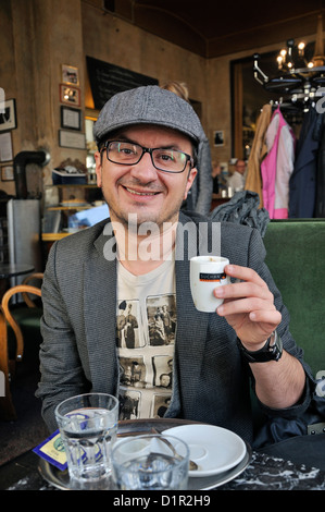 Man drinking coffee in café Vienna Austria Stock Photo