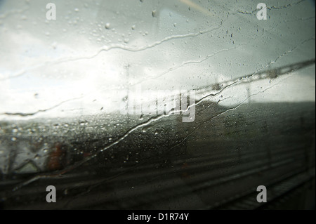 view through a window of a train on a rainy day Stock Photo
