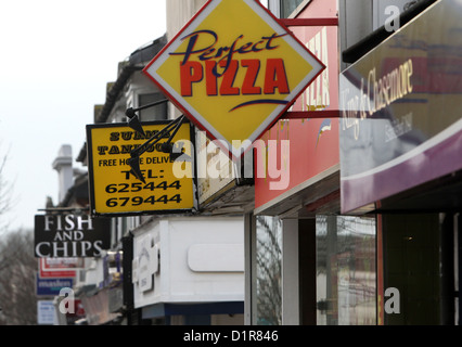 Take Aways and Fast Food outlets side by side in Lewes Road, Brighton, East Sussex, UK. Stock Photo