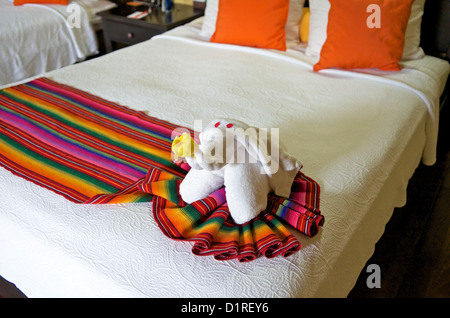 Elephant towel art on a bed, Nayara Hotel, Spa & Gardens, Oeste de Fortuna, La Fortuna de San Carlos, Costa Rica Stock Photo