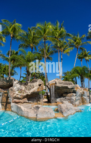 SAN JUAN, PUERTO RICO - Swimming pool at InterContinental Hotel, a beach resort at Isla Verde. Stock Photo