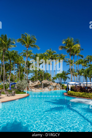 SAN JUAN, PUERTO RICO - Swimming pool at InterContinental Hotel, a beach resort at Isla Verde. Stock Photo