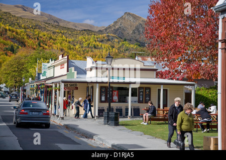 Arrowtown in New Zealand, former gold mining town in the Otago region of South Island with autumn fall colours on the leaves and hills Stock Photo