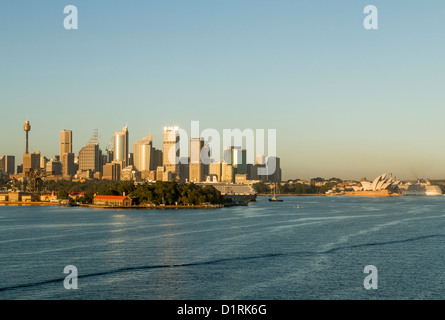 Sydney cityscape as seen from a cruise ship on Sydney Harbour, Australia in early morning light Stock Photo