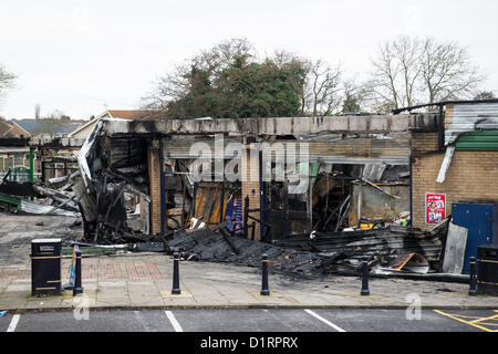 Triangle Shops, Laindon, Basildon, Essex. The day after a fire ripped through four businesses razing them to the ground. Council officials begin to assess the damage to the parade of shops they own and rent to the businesses and arrange site security.  Credit:  Allsorts Stock Photo / Alamy Live News Stock Photo