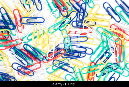 Assorted color paperclips on white background Stock Photo