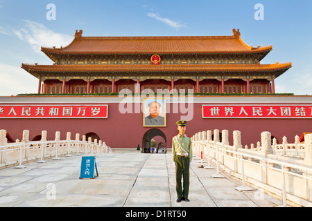 Chinese soldier guarding Tiananmen Tower under Chairman Mao's portrait, Gate of Heavenly Peace Beijing China Asia Stock Photo