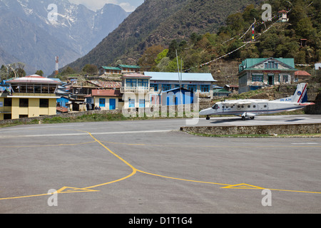 A plane on the runway at the airport at Lukla, Khumbu Nepal Asia Stock Photo