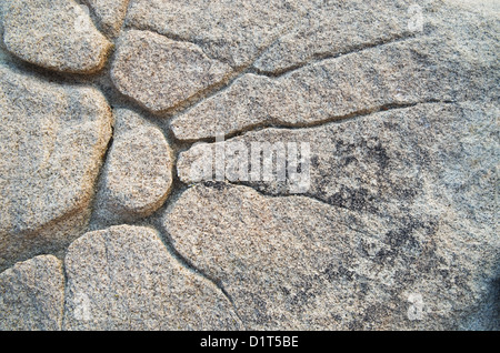 natural sunburst pattern eroded in granite rock Stock Photo