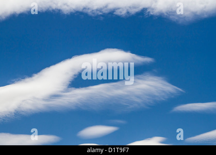 Unusual formations of Cirrus Uncinus cloud formations