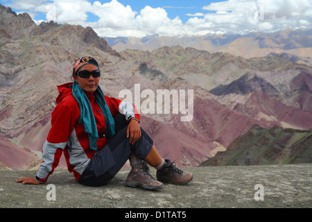 a female trekker in the indian himalayan mountains Stock Photo