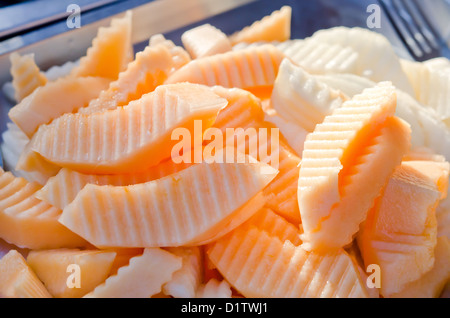 sliced ripe aromatic muskmelon , peeled melon Stock Photo