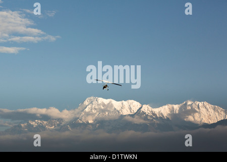 icrolight flying near the Annapurna I and III in the Himalayas, Nepal Stock Photo