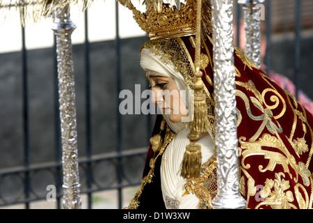 Float (pasos) carried in the street, Semana Santa, Seville. Andalucia, Spain Virgin Mary crying Stock Photo