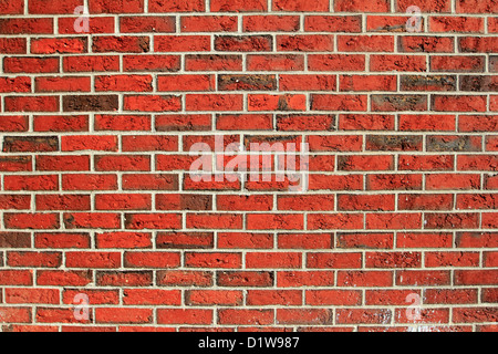 a red brick wall background backdrop pattern wallpaper Stock Photo