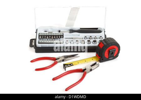 DIY work tools, screwdriver toolbox with set of bits, pliers and measuring tape Stock Photo